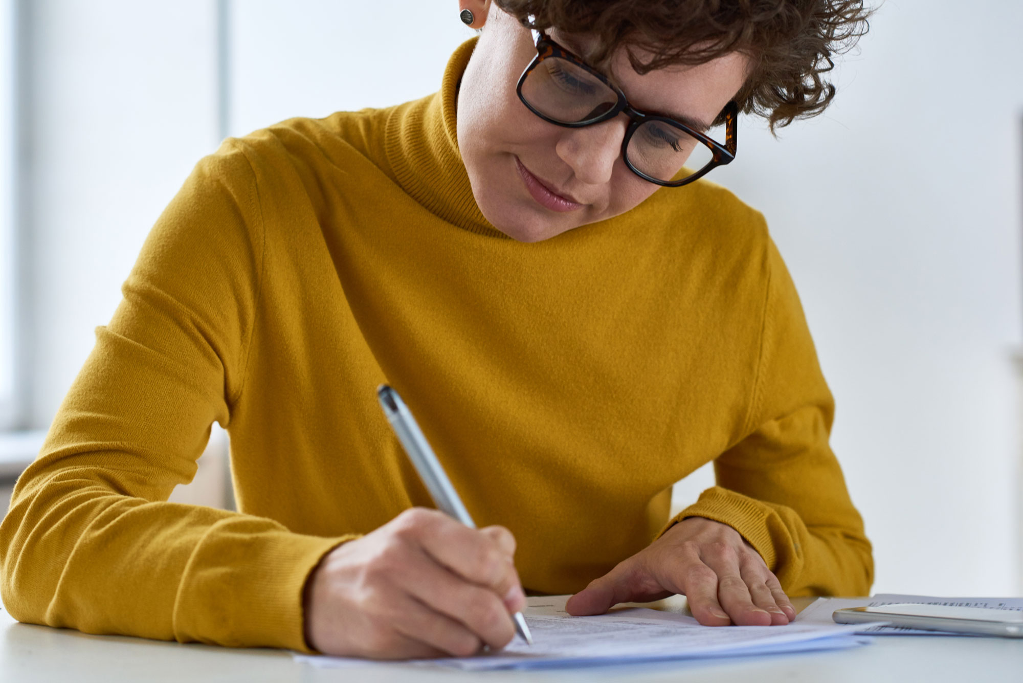women filling out forms