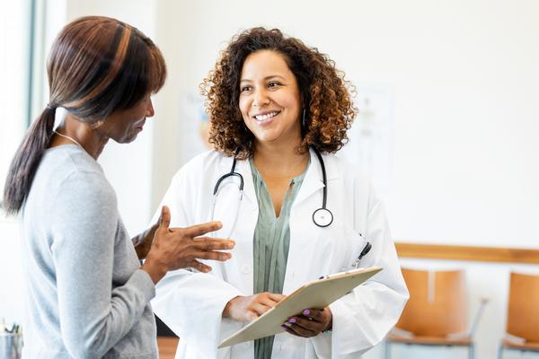 patient speaking with a primary care provider