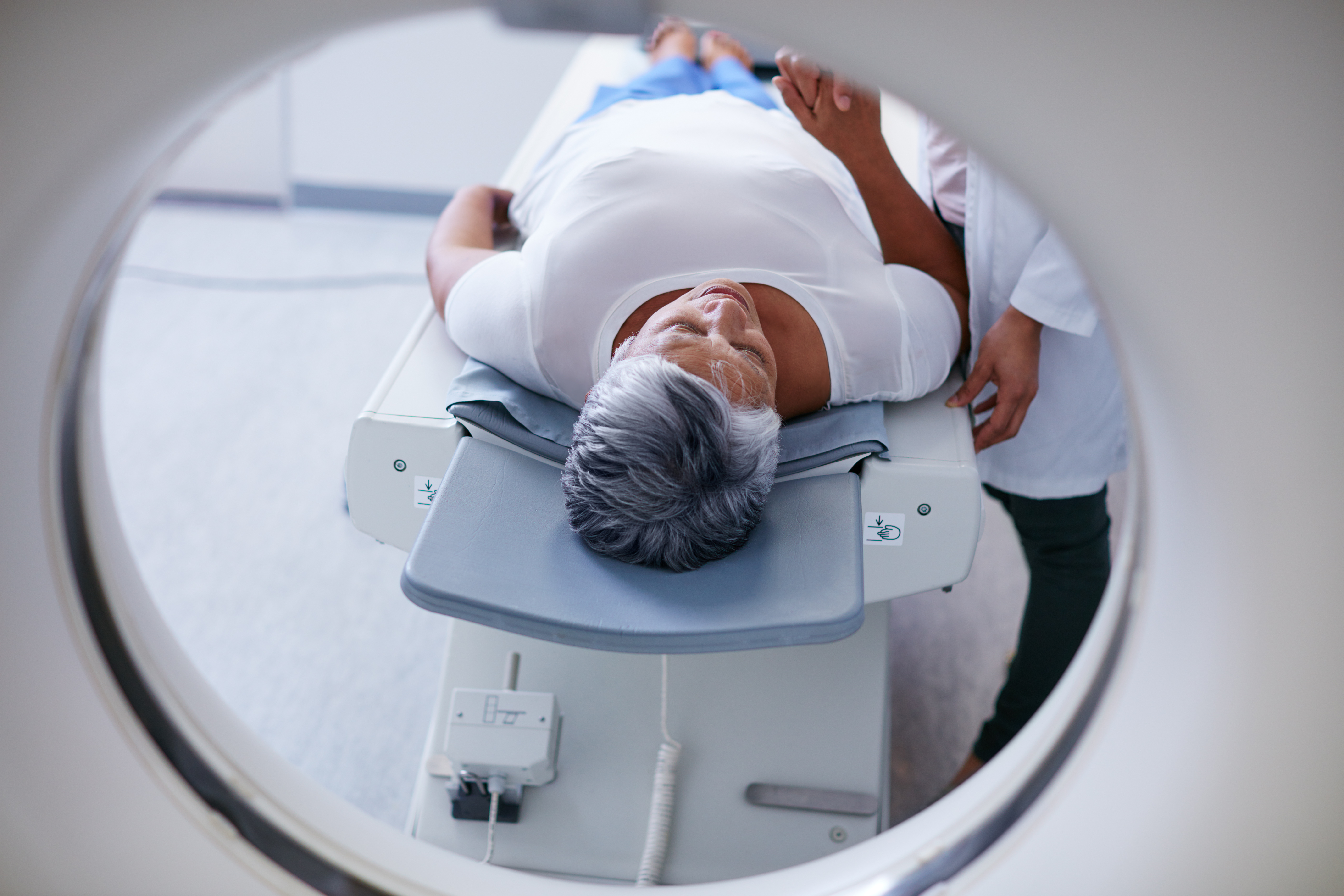 person getting a PET scan